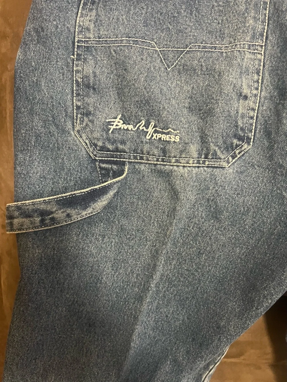 Men's Distressed Blue Jeans with Patch Detail
